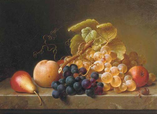 Груши, виноград и персик на столе